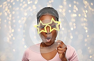 African american woman with star shaped glasses