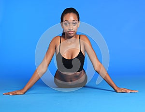 African American woman stomach stretch exercise