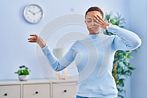 African american woman suffering dizzy standing at home