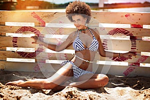 African american woman sunbathing,vacation.