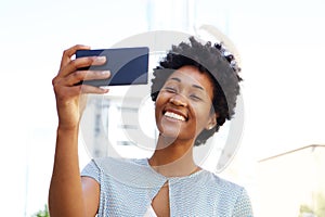 African american woman taking a selfie