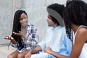 African american woman talking with friends