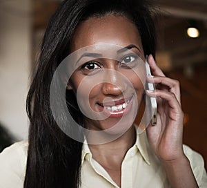 African American woman talking on a mobile phone - Black people