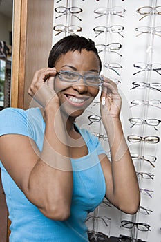 An African American Woman Trying On Spectacles