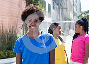 African american woman with two girlfriends in the city