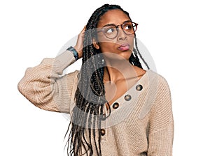 African american woman wearing casual clothes confuse and wondering about question