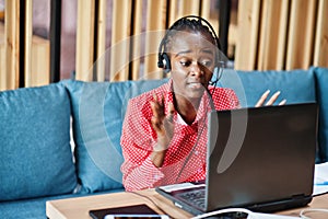 African american woman works in a call center.