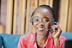 African american woman works in a call center.
