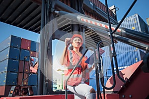 African American worker woman working in containers industry