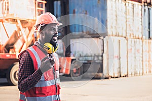 African American workers man, working in containers industry