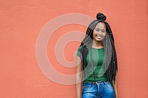 African american young adult woman with amazing hairstyle and copy space photo
