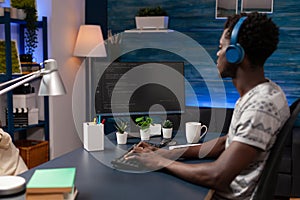 African american young programmer working remote from home