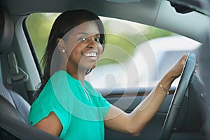 African American young woman in car photo