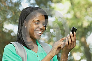 African American young woman on smart phone