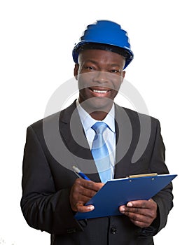 African architect laughing at camera