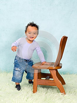 African baby boy trying to stand