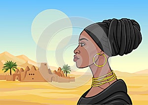 African beauty: animation portrait of the  beautiful black woman in a turban and gold jewelry.