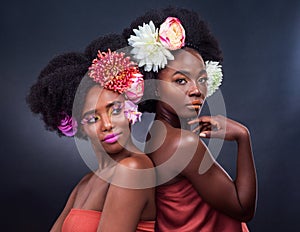 African, beauty and flowers in spring for makeup and art in dark background, studio and mockup. Floral, cosmetics and