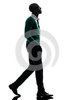 African black man walking looking up silhouette