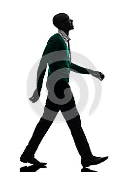 african black man walking looking up smiling silhouette silhouette