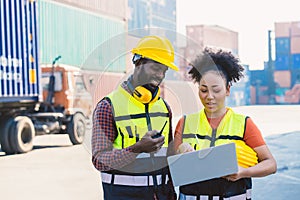 African black worker couple coworking team together at port cargo shipping industry loading container yard