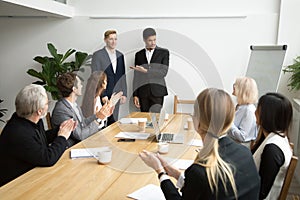 African boss introducing new hire employee to corporate team app