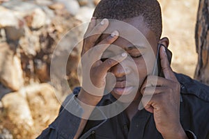 African boy on cell phone