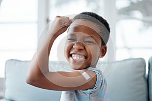 African boy kid, vaccine and portrait with smile, medicine and flex muscle for wellness in hospital. Male child, strong