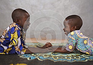 African boys children are Holding Hands and lots of Copy Space