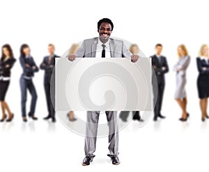 African business man and group holding a banner