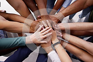 African business team huddle, hands together photo