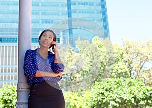 African business woman calling by mobile phone