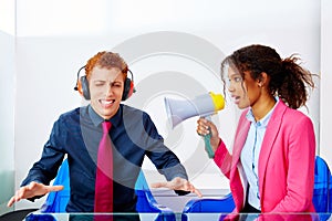 African business woman talking in megaphone