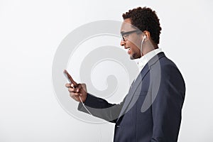 African businessman listening to the music