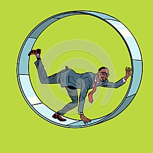 african businessman in a squirrel wheel. Routine monotonous work. A man in captivity of his affairs