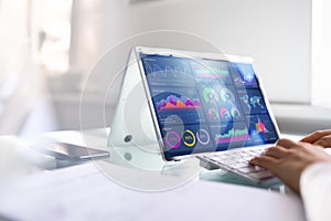 African Businesswoman Using Analytics Data KPI Dashboard