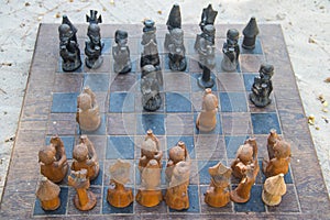 African chess, hand made from baobab wood. African style wooden figurine, local art