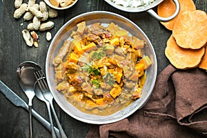 African chicken peanut stew with sweet potatoes with side of basmati rice