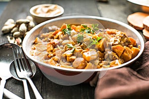 African chicken peanut stew with sweet potatoes with side of basmati rice