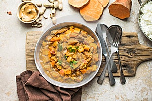 African chicken peanut stew with sweet potatoes with side of basmati rice