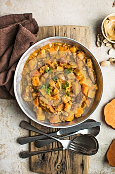 African chicken peanut stew with sweet potatoes with side of basmati rice