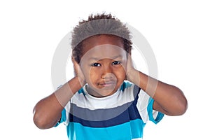 African child covering his ears