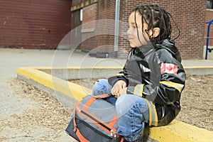 African child in the playground of a shool