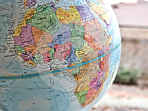 African continent focus macro shot on globe map for travel blogs, social media, website banners and backgrounds.