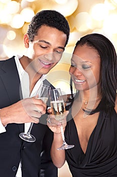 African Couple Enjoying Champagne Drink