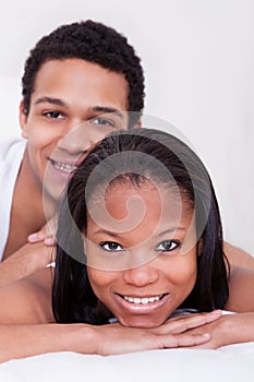 African Couple Looking At Camera