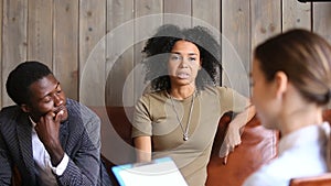 African couple meeting psychologist, black unhappy woman sharing marital problems