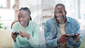 African couple, video game controller and sofa with contest, playing and push with comic laugh, home and esports. Black