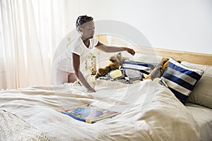 African descent girl in a bedroom photo