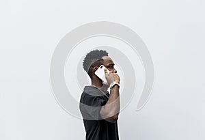 African descent man using mobile phone